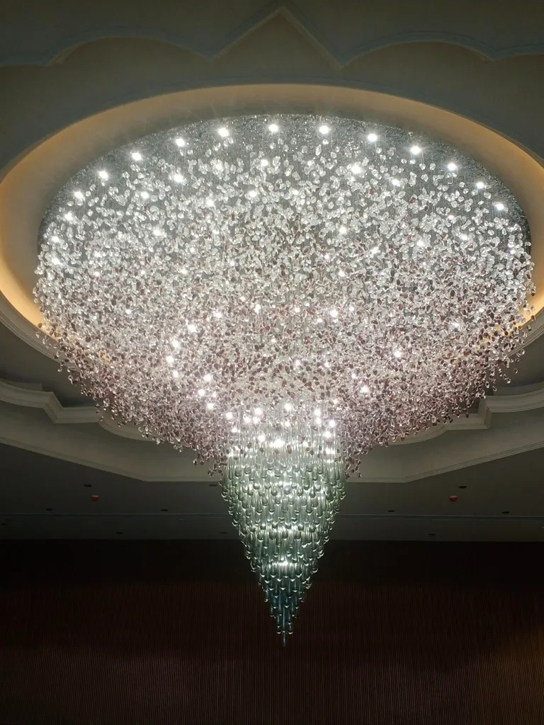 New modern chandelier installation
